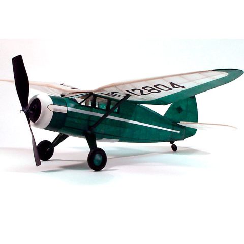 Dumas Gummimotorflugzeug im Retro-Design mit grüner Lackierung und Propeller, Modellansicht.